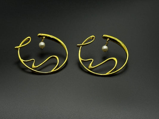 Golden Wave Brass Earrings with Pearl Drop – Modern Art-Inspired Statement Jewelry